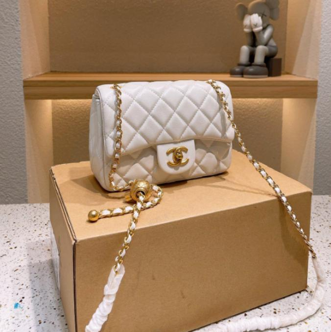 CHNL Lambskin Pearl Crush White Flap Leather Handbag with Gold Signature CC Buckle