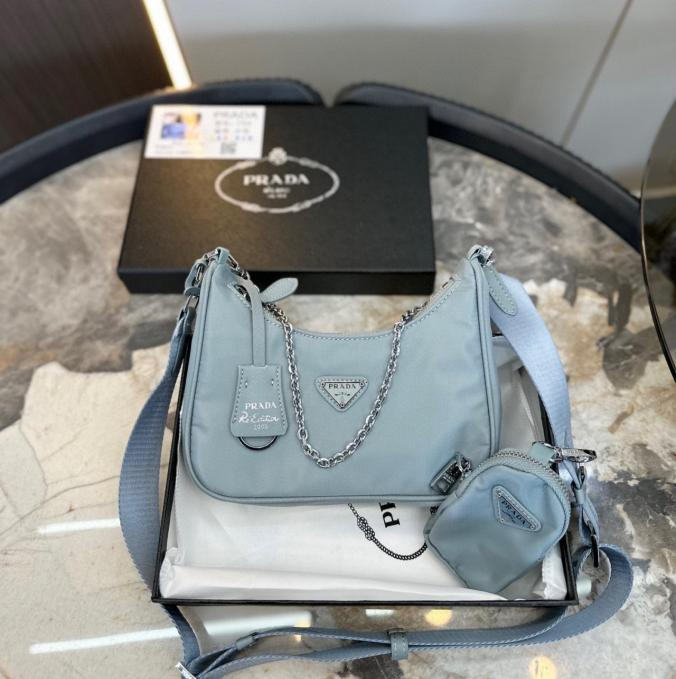 Prada Re-Edition 2005 Pale Blue Nylon Luxury Leather Bag with Pouch