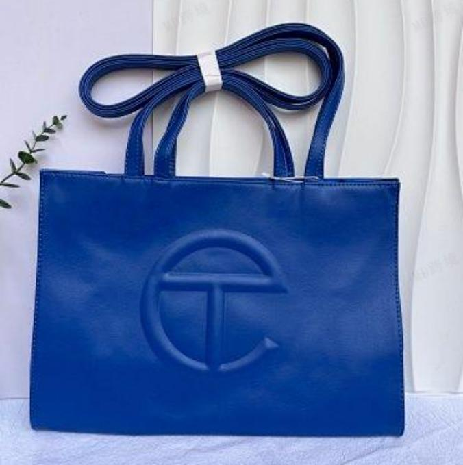 Telfar Blue Embossed Same Color Logo Bag