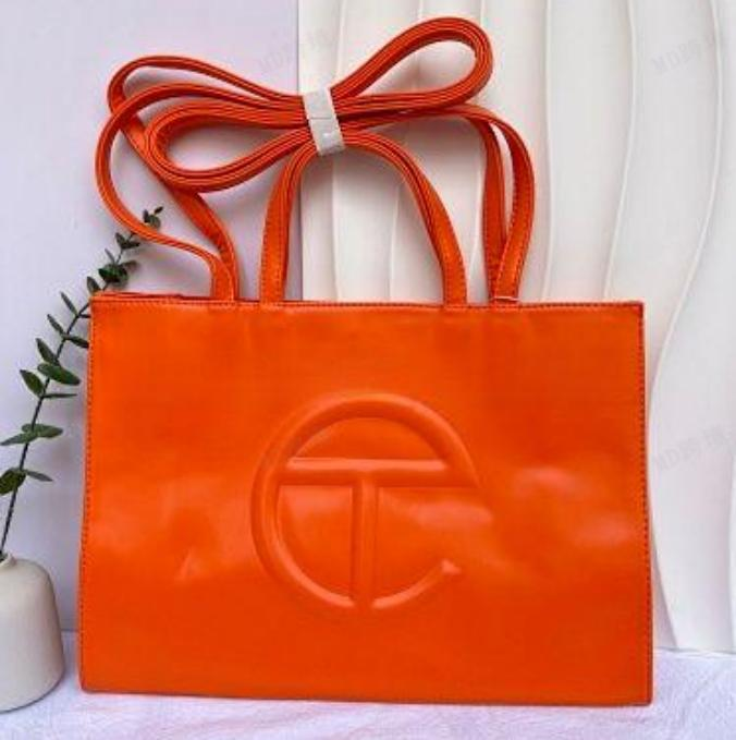 Orange Telfar Embossed Same Color Logo Crossbody Bag