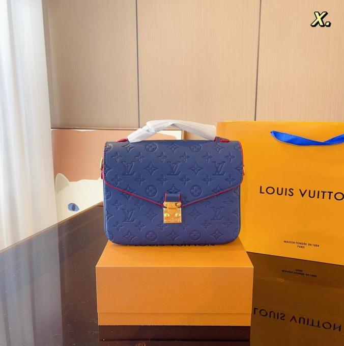 LV Pochette Métis Monogram Blue Empreinte Leather with Red trim & Gold Color Hardware Bag